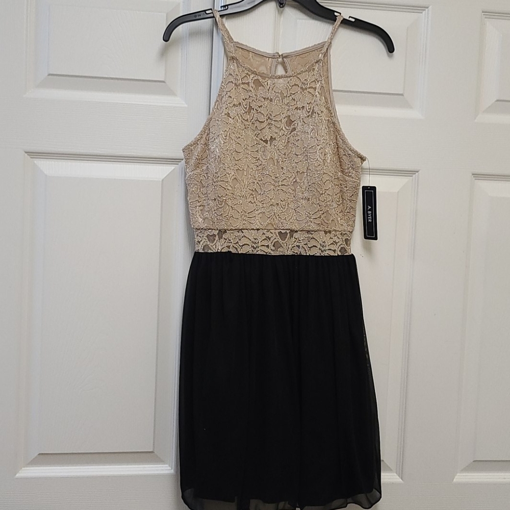 A byer size 5 Gold/black dress